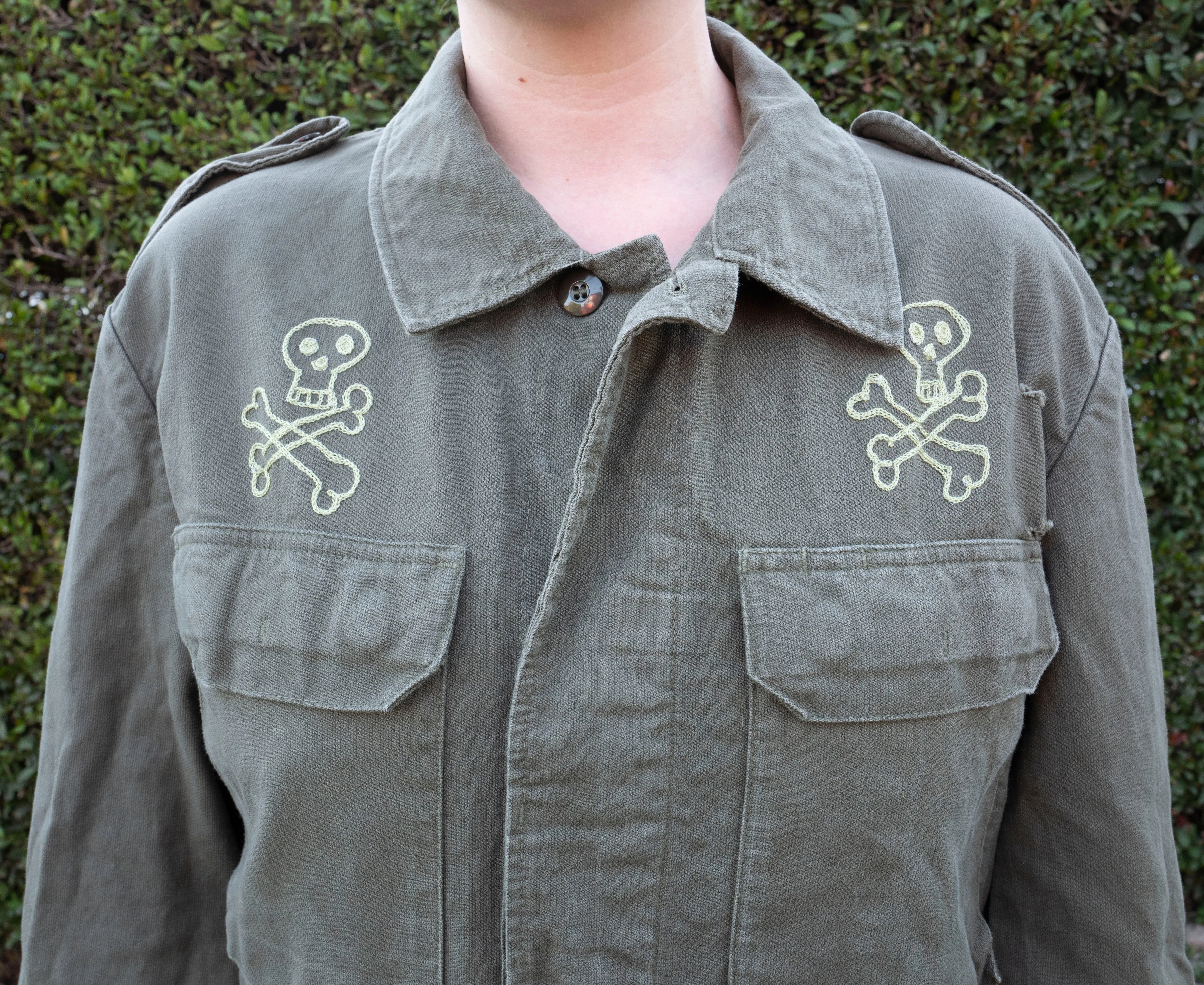 Olive Drab German military jacket: skull crossbones and snake vs mouse